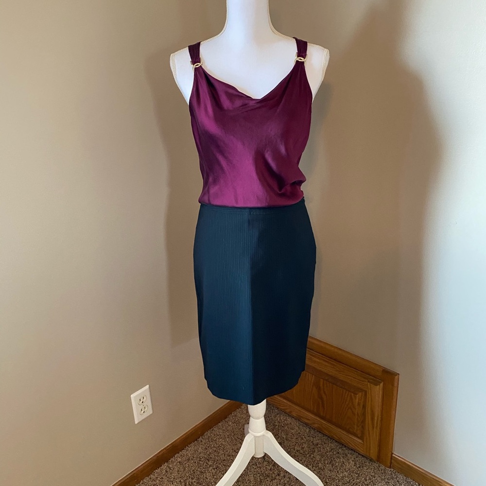 Sleeveless blouse with gold embellishment